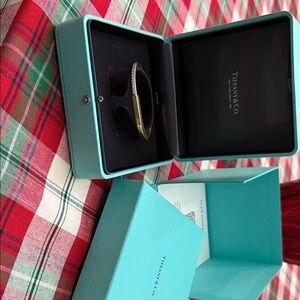 Tiffany & Co. Two-Tone lock Bracelet in Gold and Silver